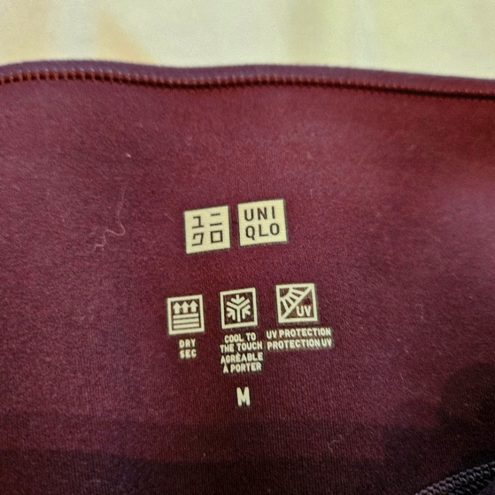 Uniqlo Wine LEGGINGS. M. LIKE NEW.
